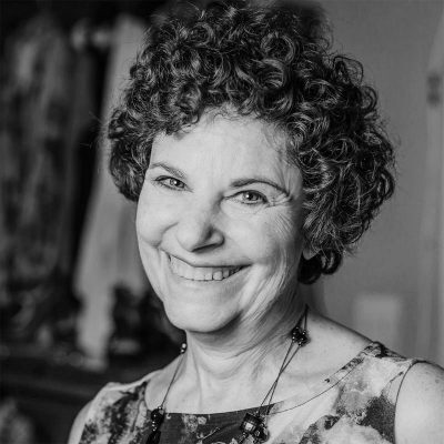 a woman smiling at the camera